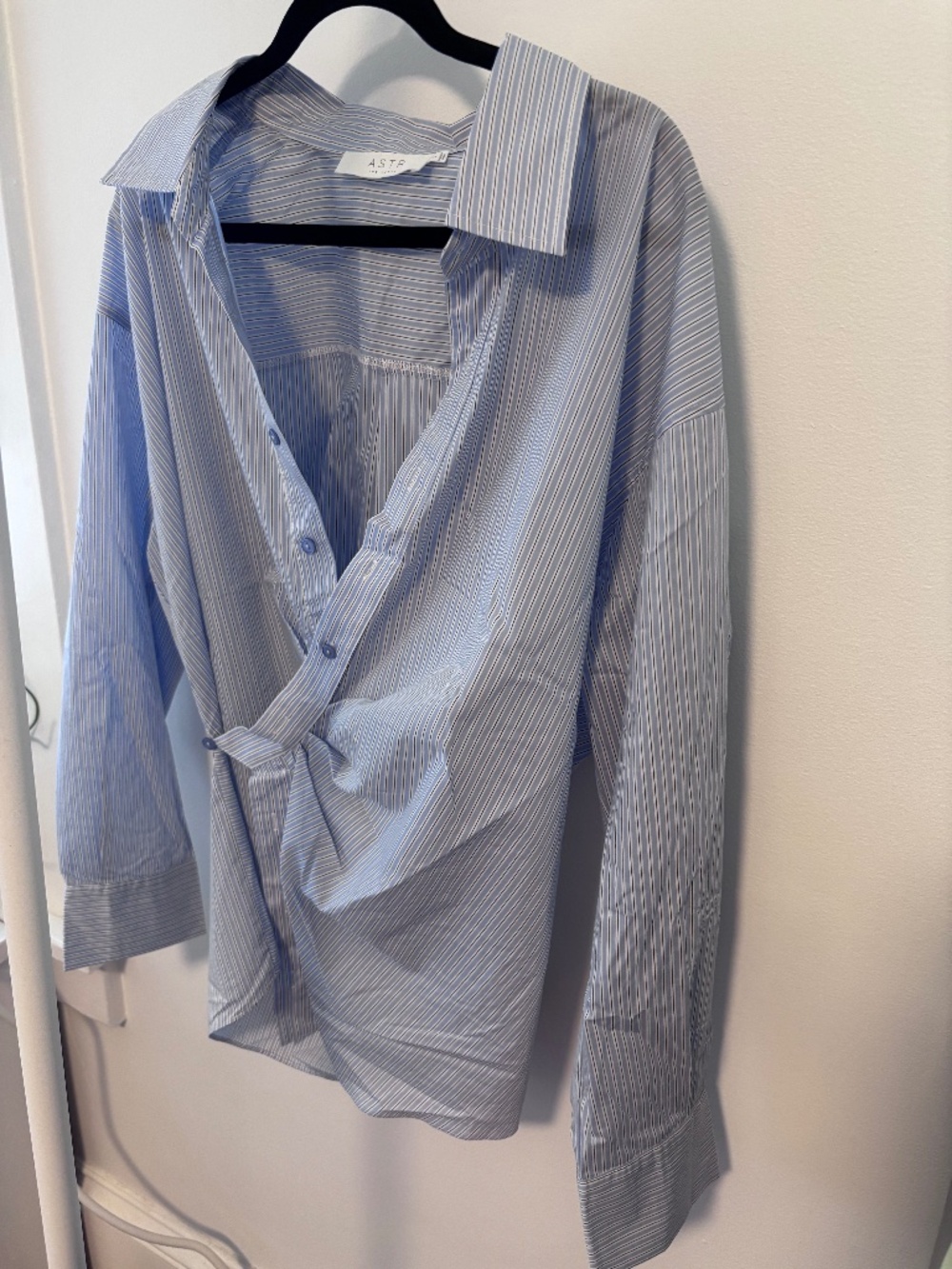 ASTR womens size L blue striped button down shirt with wrap styling